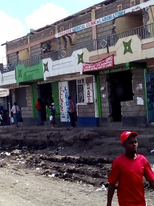 Casuals demolishing a building to pave way for road construction  in Mukuru